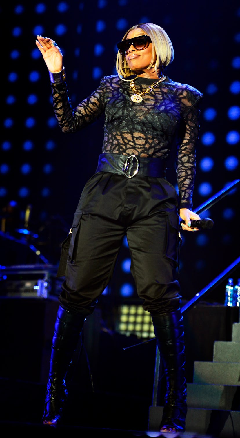 Mary J. Blige in a sheer top and trousers.