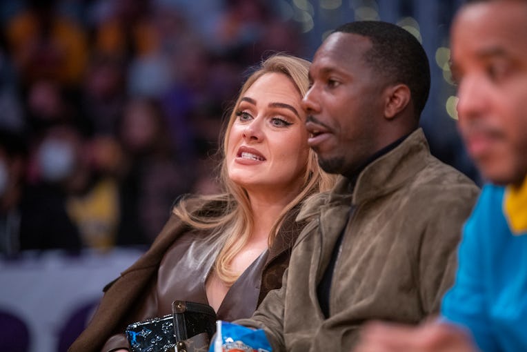 Los Angeles, CA - October 19: Singer Adele and sports agent Rich Paul attend a game between the Gold...