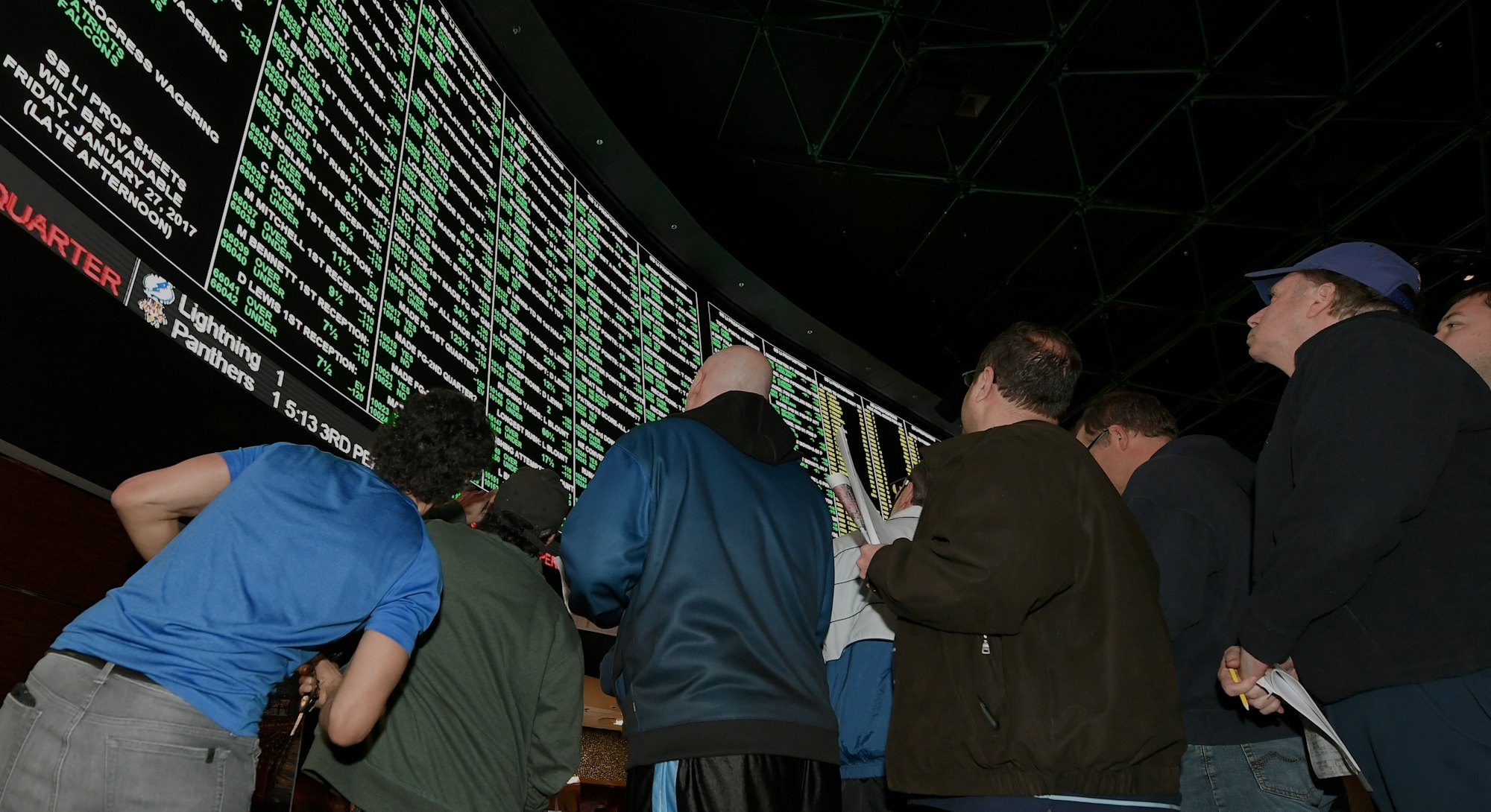 LAS VEGAS, NV - JANUARY 26:  Bettors line up to place wagers after more than 400 proposition bets fo...