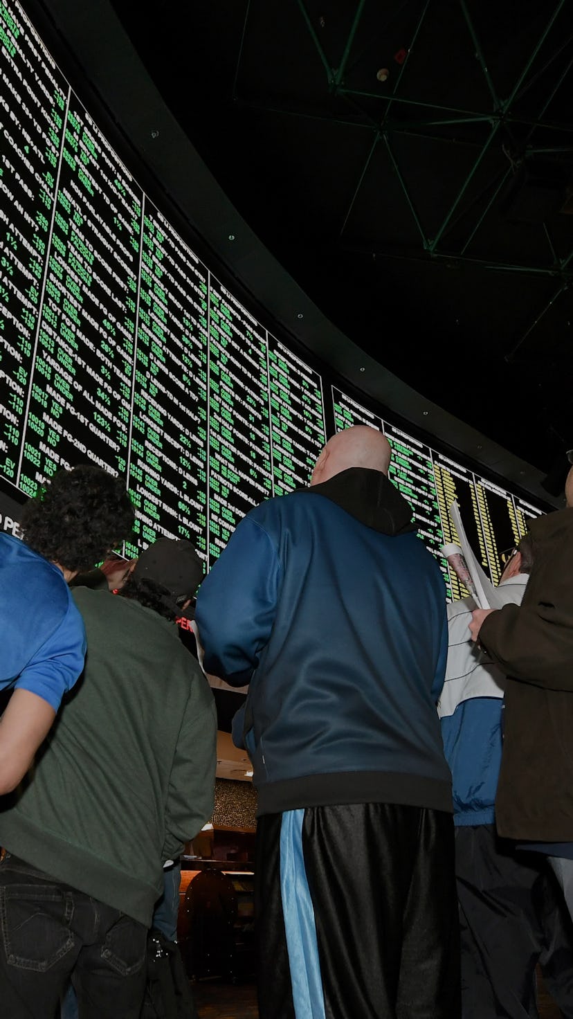 LAS VEGAS, NV - JANUARY 26: Bettors line up to place wagers after more than 400 proposition bets fo...