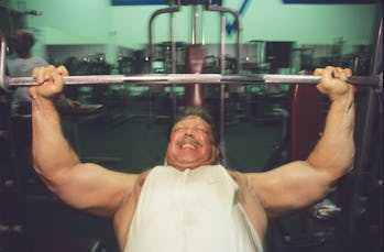 Chris Langan, bouncer, works out with weights in a gym in Long Island. (Photo by mark peterson/Corbi...