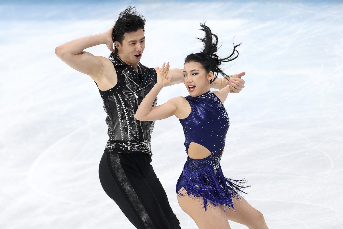 BEIJING, CHINA - FEBRUARY 12: Shiyue Wang and Xinyu Liu of China skate during the Ice Dance Rhythm D...