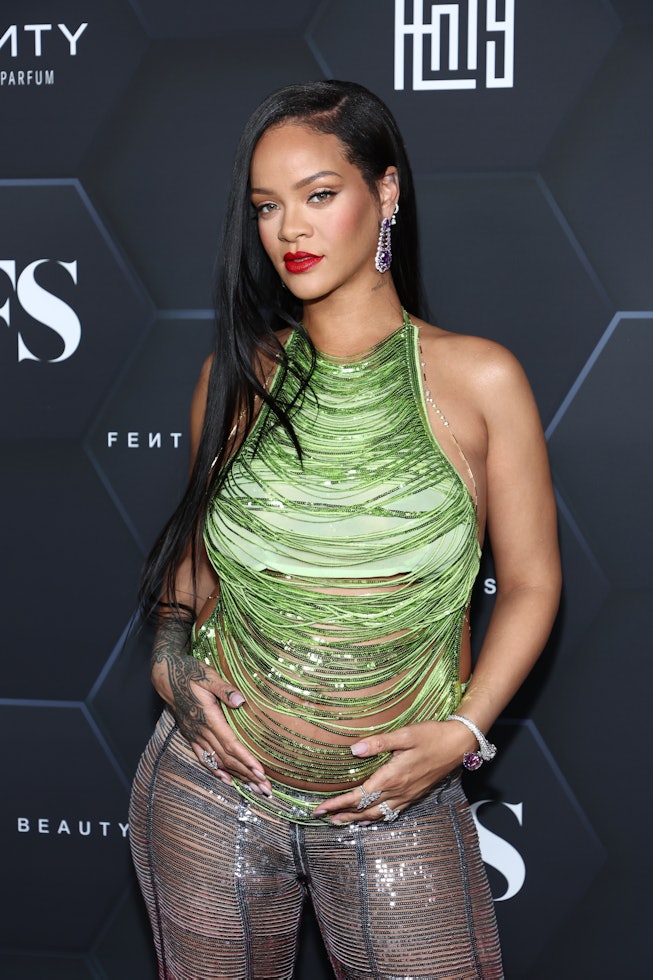 LOS ANGELES, CALIFORNIA - FEBRUARY 11: Rihanna poses for a picture as she celebrates her beauty bran...