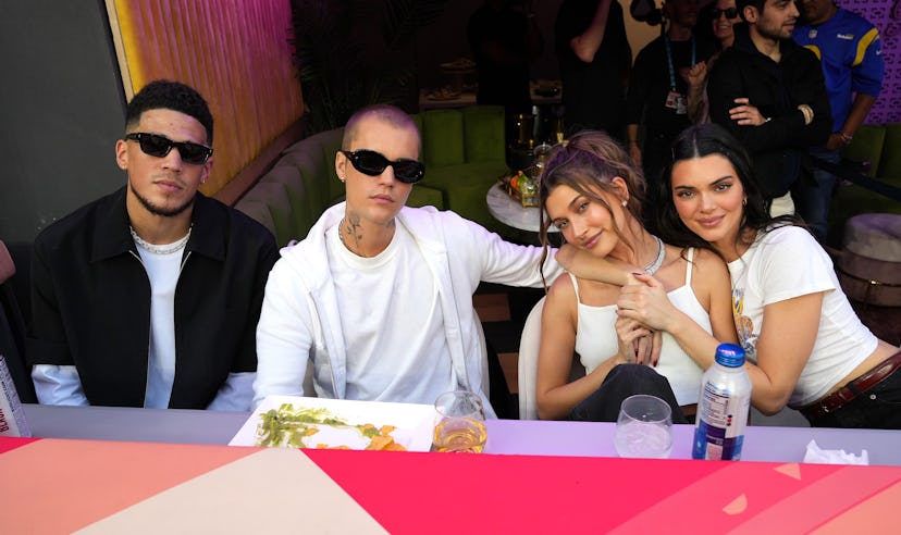 Justin Bieber, Hailey Bieber, and Kendall Jenner attend the 2022 Super Bowl. 