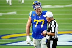 INGLEWOOD, CALIFORNIA - OCTOBER 24: Andrew Whitworth #77 of the Los Angeles Rams talks with referee ...