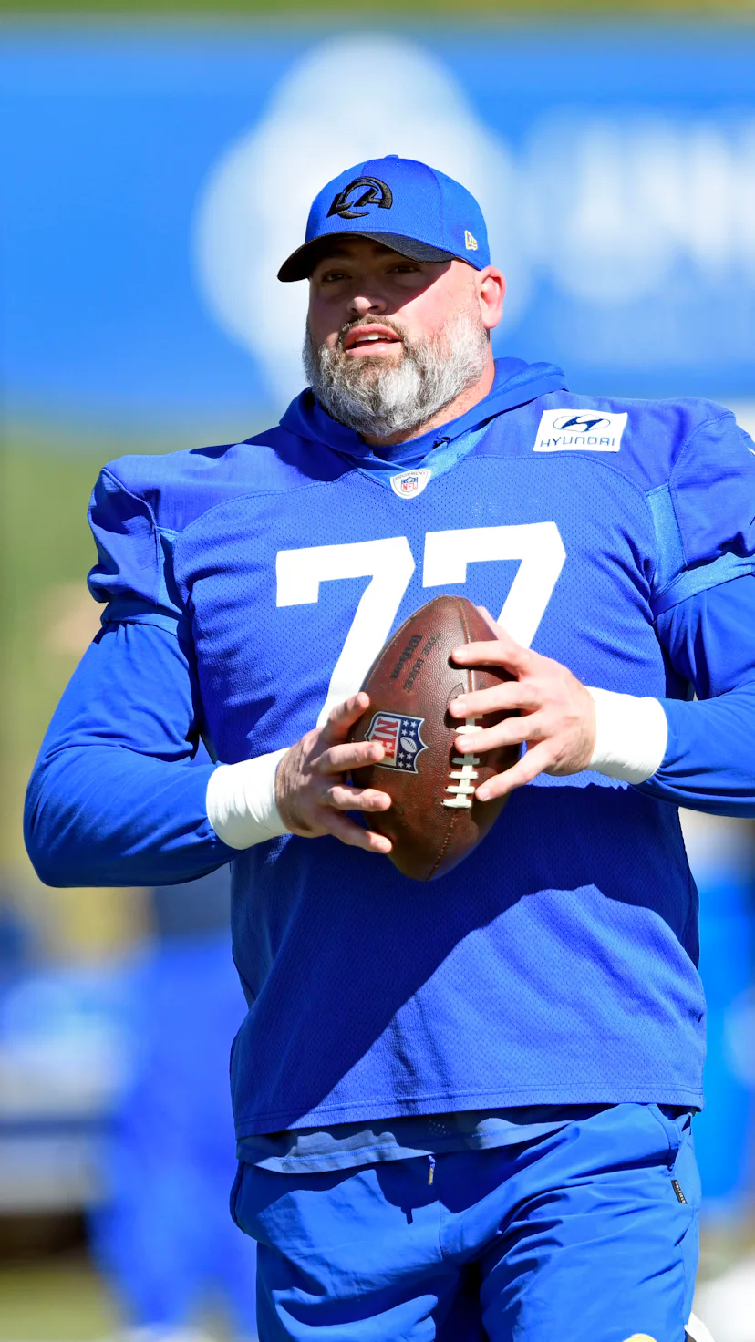 Andrew Whitworth's kid was caught reading at the 2022 Super Bowl.
