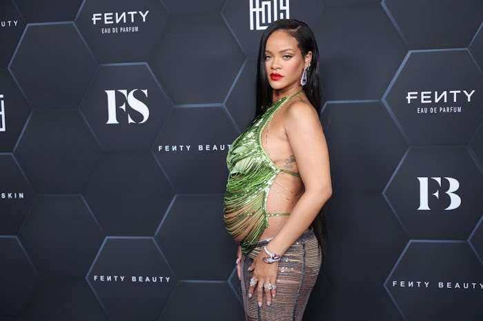 LOS ANGELES, CALIFORNIA - FEBRUARY 11: Rihanna poses for a picture as she celebrates her beauty bran...
