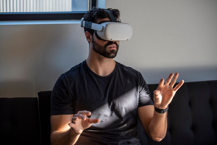 Gavin Menichini, using the Oculus Quest 2 VR headset, gives a demonstration of the Immersed Virtual ...