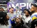 Inglewood, CA - February 13:  Los Angeles Rams players celebrate with the trophy after the Rams defe...