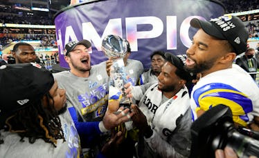 Inglewood, CA - February 13:  Los Angeles Rams players celebrate with the trophy after the Rams defe...