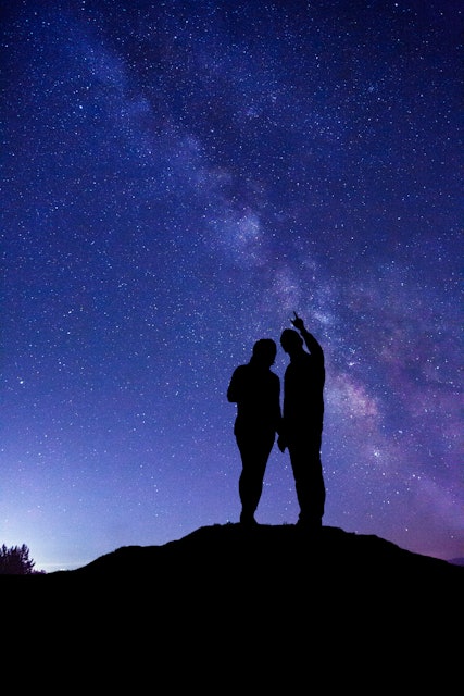 couple gazing up at the stars 