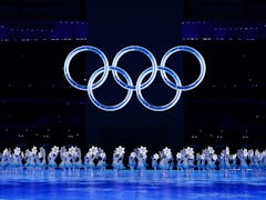 Placard bearers perform during the opening ceremony of the Beijing 2022 Olympic Winter Games at the ...