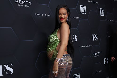 LOS ANGELES, CALIFORNIA - FEBRUARY 11: Rihanna poses for a picture as she celebrates her beauty bran...