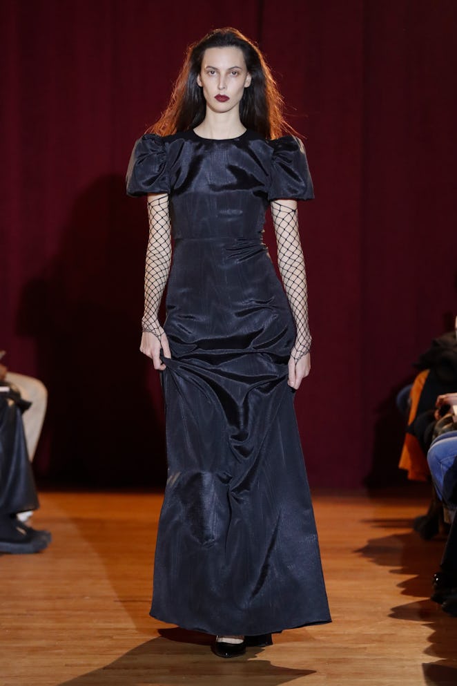 NEW-YORK, USA - FEBRUARY 13: A model walks the runway during the Puppets and Puppets Ready to Wear F...