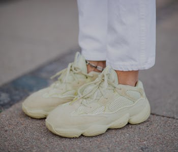 COPENHAGEN, DENMARK - AUGUST 07: Lisa Hahnbueck wearing Yeezy 500 Adidas sneaker, white Redone Levis...