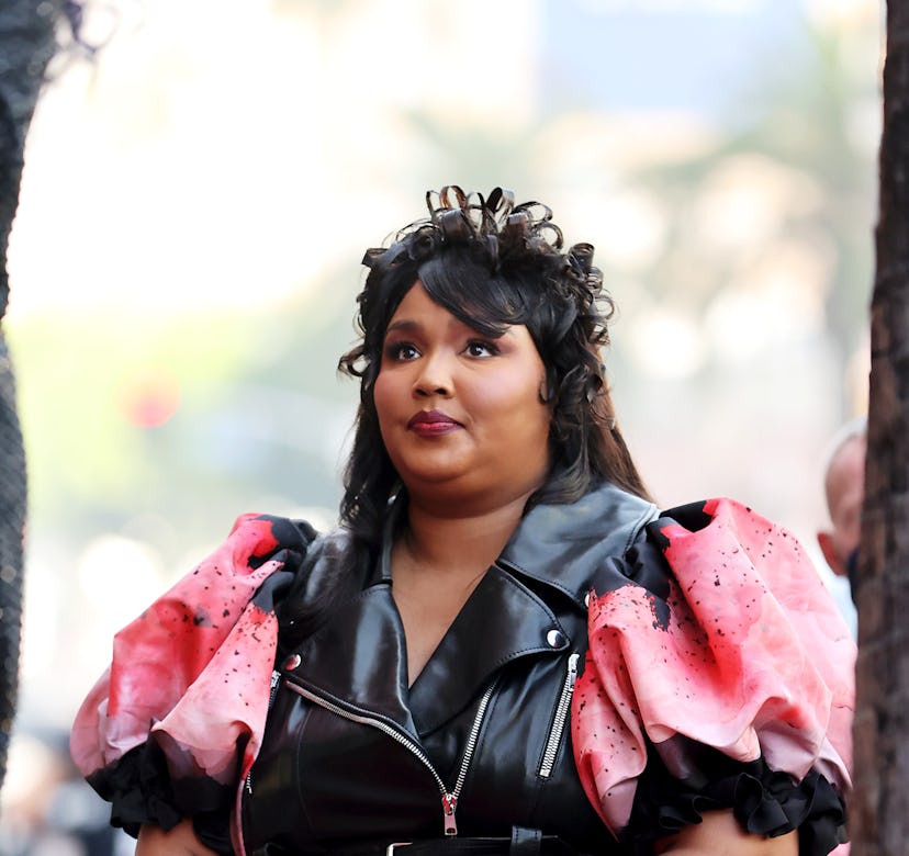 Lizzo in a red dress for the Hollywood Walk of Fame Star Ceremony.