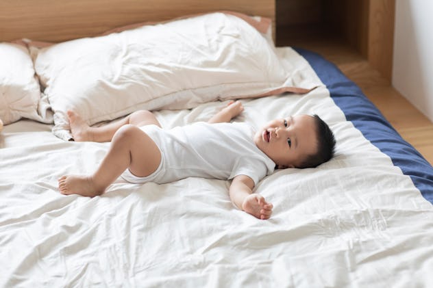 baby boy on bed