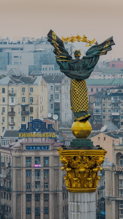 Statue of Berehynia sits atop a column high above Maidan Nezalezhnosti, also known as Independence S...