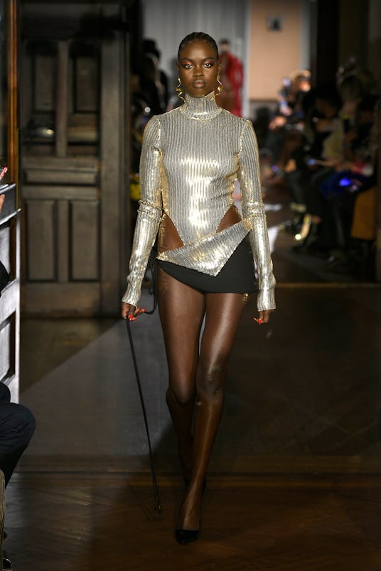 NEW YORK, NEW YORK - FEBRUARY 14: A model walks the runway during LaQuan Smith - February 2022 New Y...