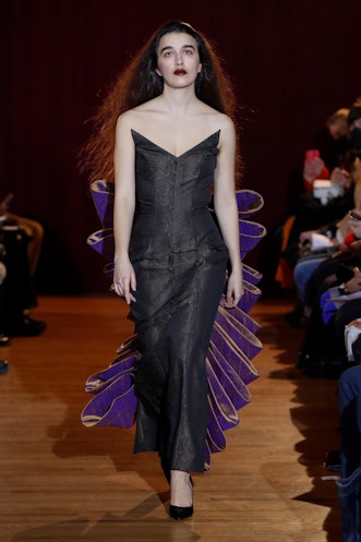 NEW-YORK, USA - FEBRUARY 13: A model walks the runway during the Puppets and Puppets Ready to Wear F...