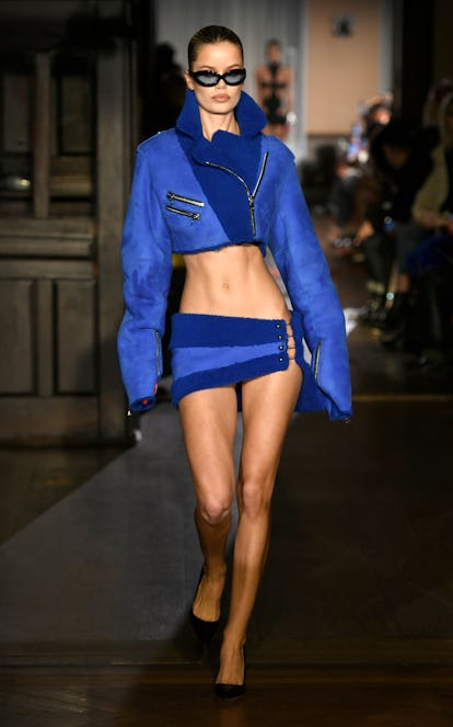 NEW YORK, NEW YORK - FEBRUARY 14: A model walks the runway during LaQuan Smith - February 2022 New Y...
