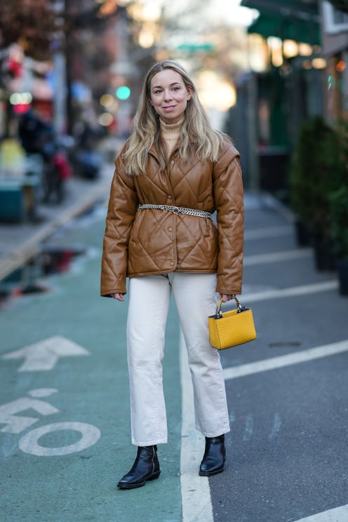 Woman wearing white jeans