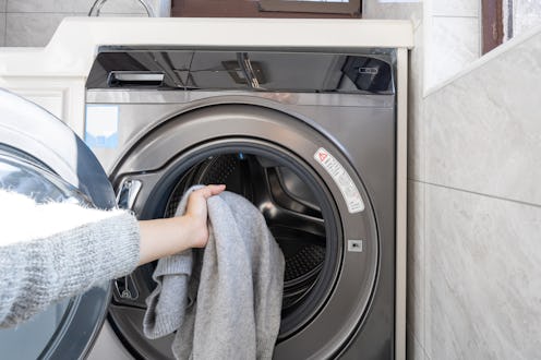 person doing laundry