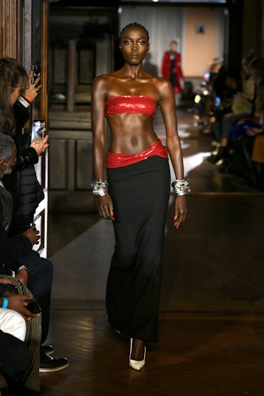 NEW YORK, NEW YORK - FEBRUARY 14: A model walks the runway during LaQuan Smith - February 2022 New Y...