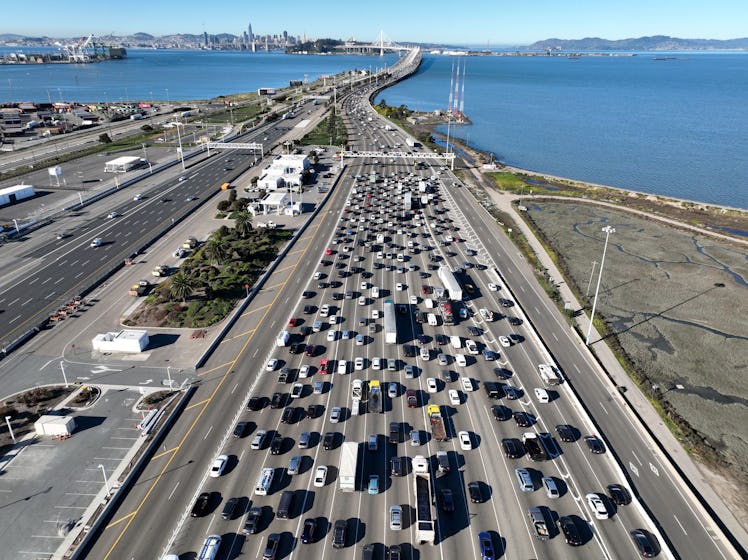 OAKLAND, CALIFORNIA - FEBRUARY 16: In an aerial view, traffic backs up at the San Francisco–Oakland ...