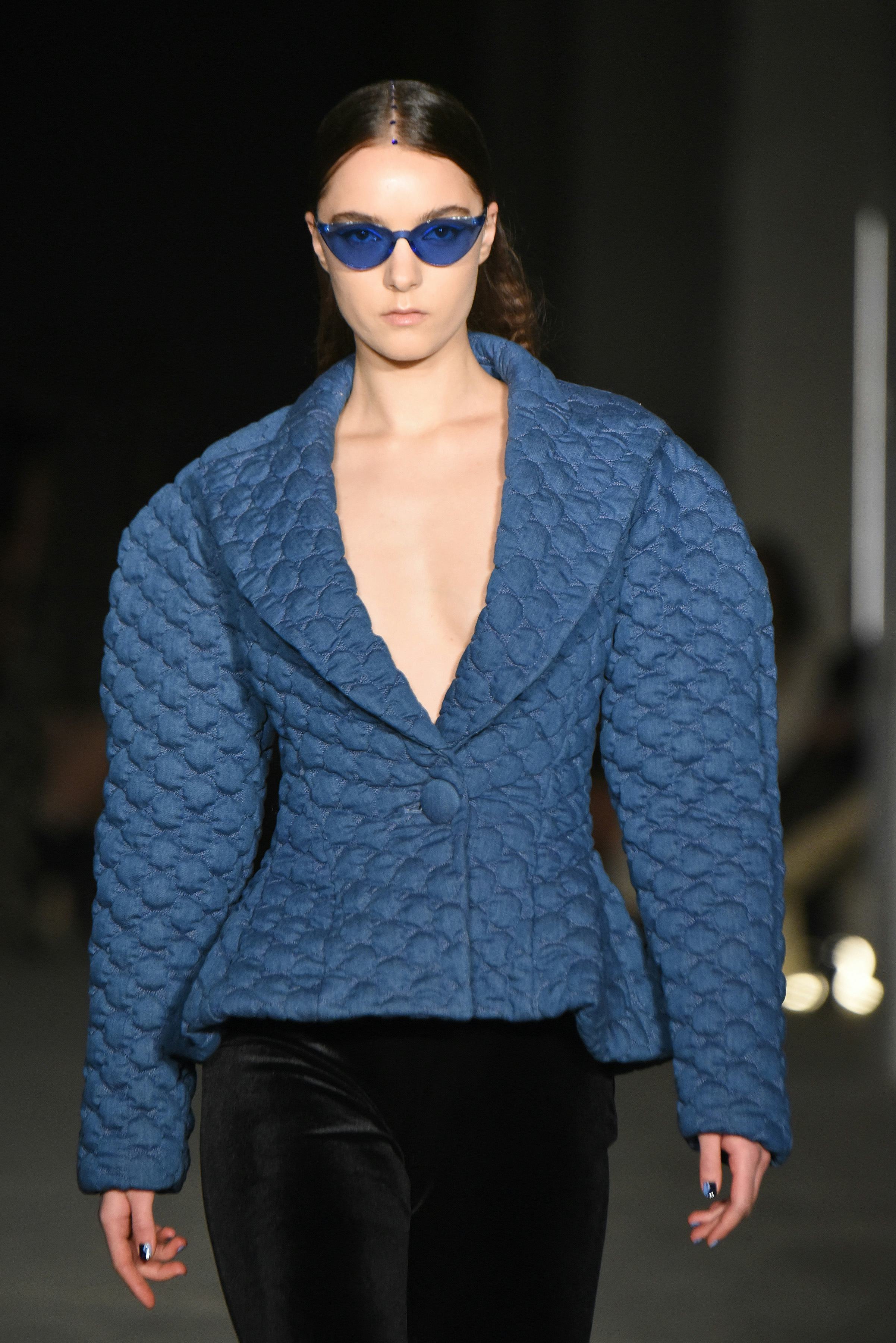 NEW YORK, NEW YORK - FEBRUARY 12: A model walks the runway wearing Christian Siriano during Christia...