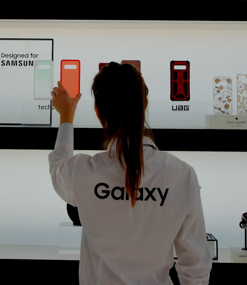 L´HOSPITALET, CATALONIA, SPAIN - 2019/02/25: A Samsung Staff member seen ordering for the accessorie...