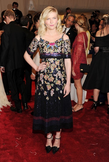 Kirsten Dunst attends the "Alexander McQueen: Savage Beauty" Costume Institute Gala 