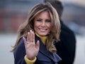 TOPSHOT - US First Lady Melania Trump boards a plane at Andrews Air Force Base for a three state ove...