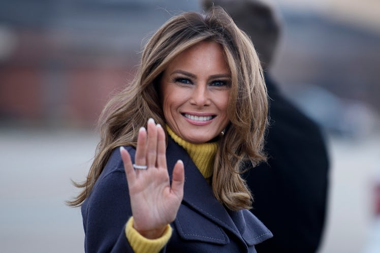 TOPSHOT - US First Lady Melania Trump boards a plane at Andrews Air Force Base for a three state ove...