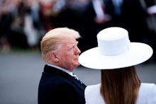 US President Donald Trump and First Lady Melania trump await their guests French President Emmanuel ...
