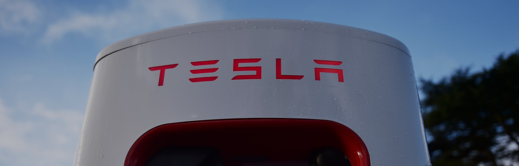 STOKE ON TRENT, ENGLAND - DECEMBER 10: A Tesla electric vehicle charging pod point at Trentham Esta...