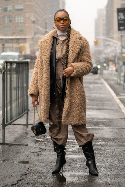 NEW YORK, NY - FEBRUARY 13: Kristian Spraggins wears a jumpsuit by Pretty Little Thing, blazer by Za...