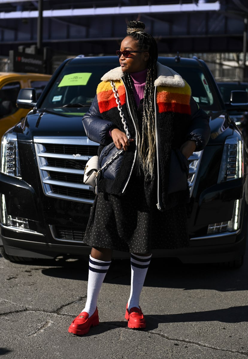 NEW YORK, NEW YORK - FEBRUARY 14: Kimberly Drew is seen wearing a Coach outfit outside the Coach sho...
