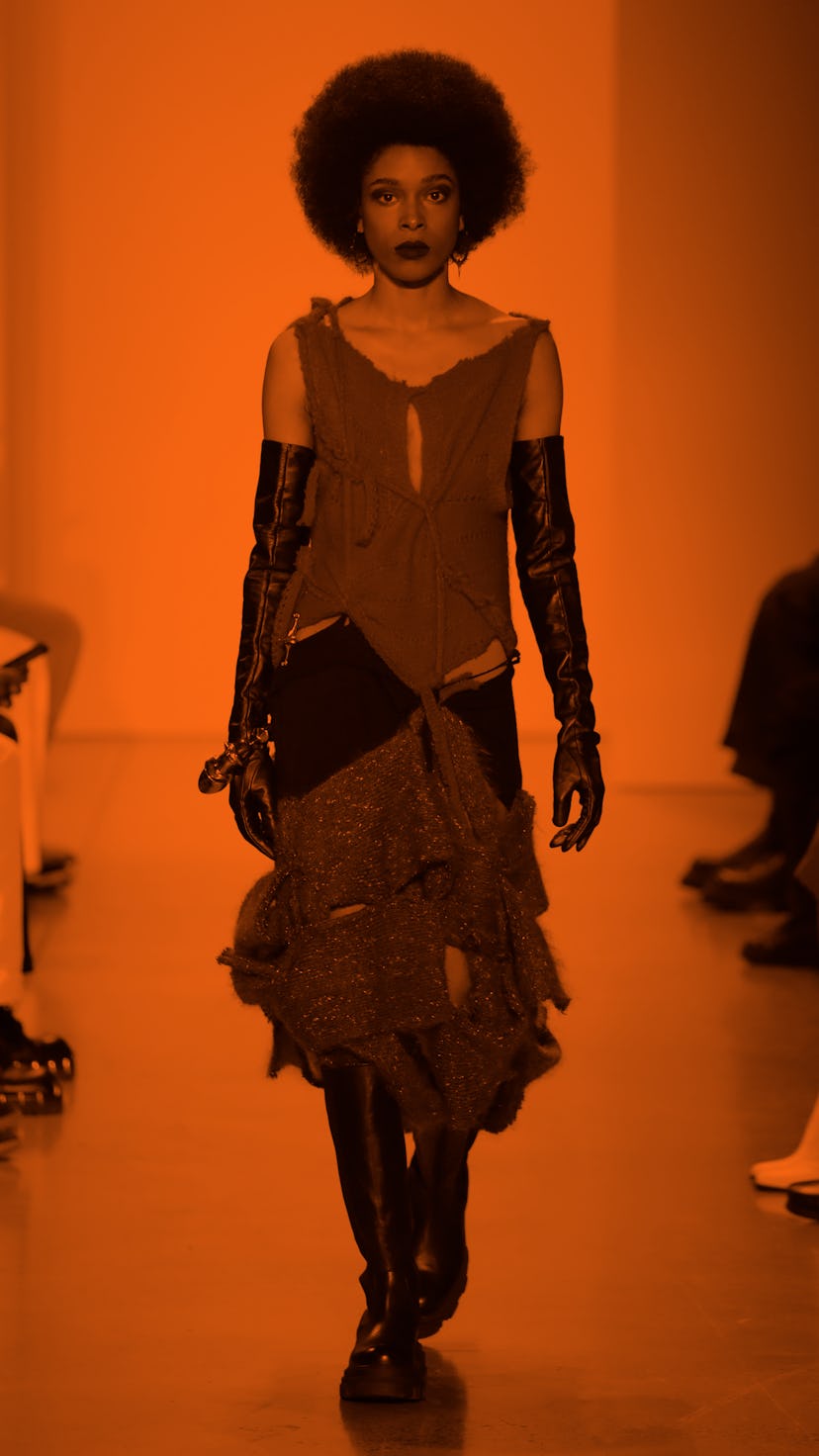 NEW YORK, NEW YORK - FEBRUARY 13: A model walks the runway wearing Khiry during the IN THE BLK Showc...