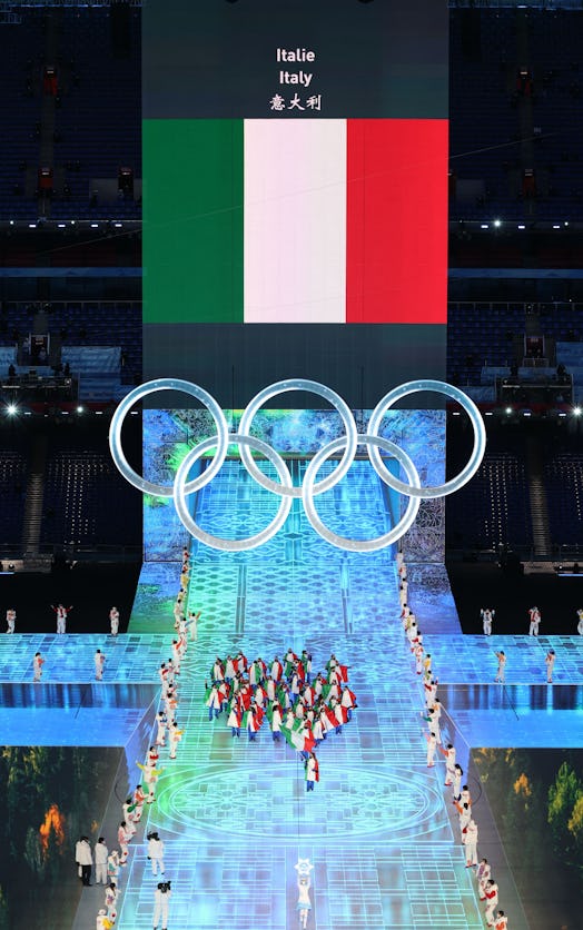 The Olympic delegation of Italy parade into the National Stadium during the opening ceremony of the ...