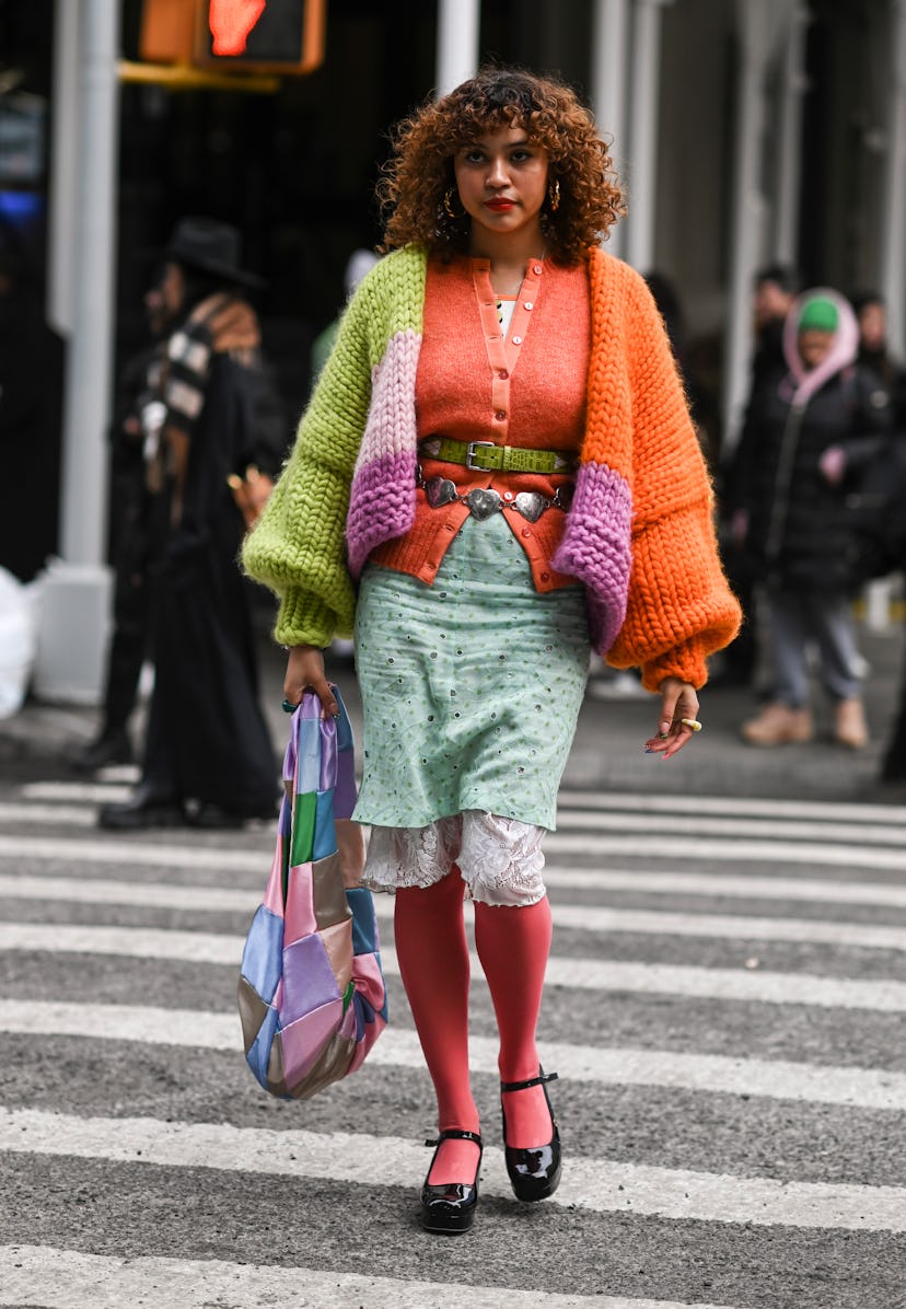 NEW YORK, NEW YORK - FEBRUARY 16: A guest is seen wearing a Collina Strada outfit outside the Collin...