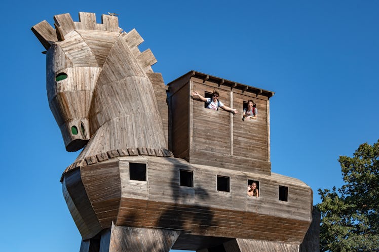Tourists visiting Giant Trojan Horse wooden replica in Çanakkale, Turkey