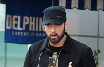 HOLLYWOOD, CALIFORNIA - JANUARY 30: Eminem attends a ceremony honoring Curtis "50 Cent" Jackson with...