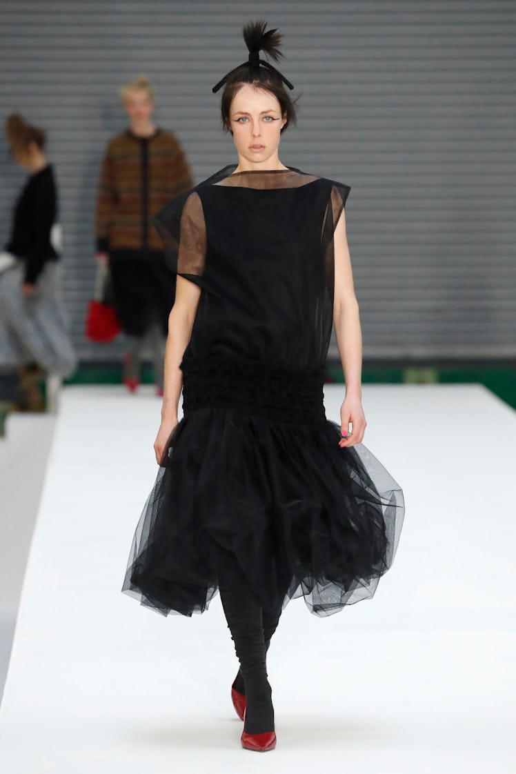 A model in a black tulle dress by Molly Goddard at the London Fashion Week Fall 2022