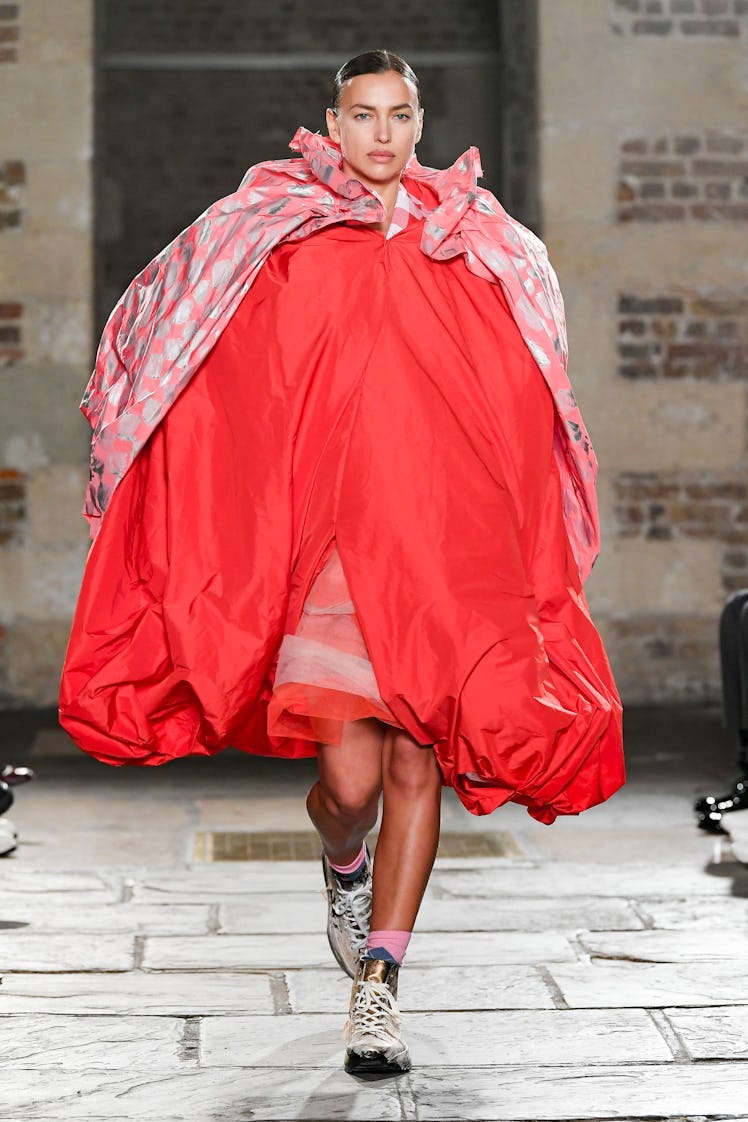 Irina Shayk in a red puffer dress by Matty Bovan at the London Fashion Week Fall 2022