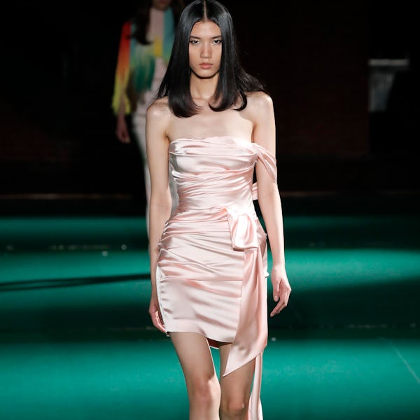 A model walks the runway at the HALPERN show during London Fashion Week February 2022 on February 19...