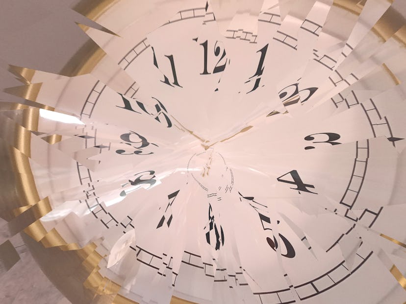 Full frame image of a classic clock face shattered in exploded parts. Here's how to calculate your l...