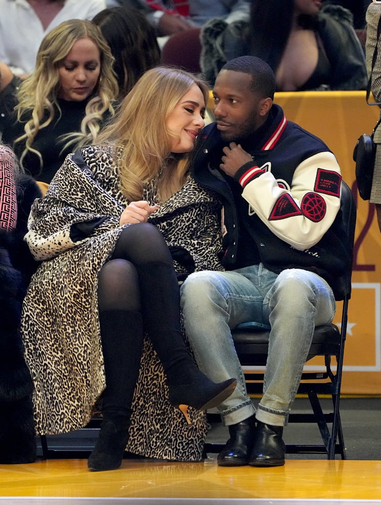 Adele wearing a leopard coat at the 2022 NBA All-Star Game. 