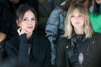 Victoria Beckham and Mia Regan attend Supriya Lele's AW22 show during London Fashion Week. 