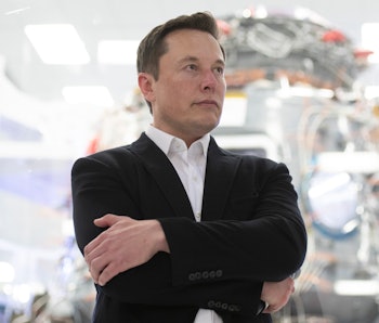 SpaceX Chief Engineer Elon Musk speaks in front of Crew Dragon cleanroom at SpaceX Headquarters in H...